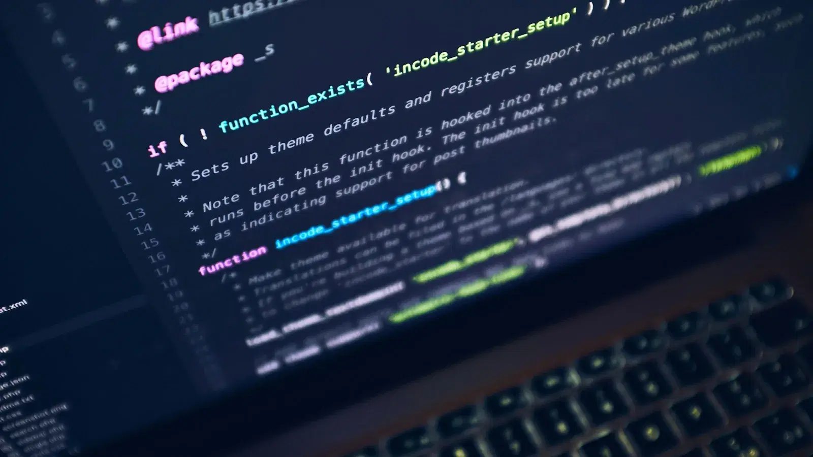 PHP source code open in a dark code editor, shallow focus across the lines.